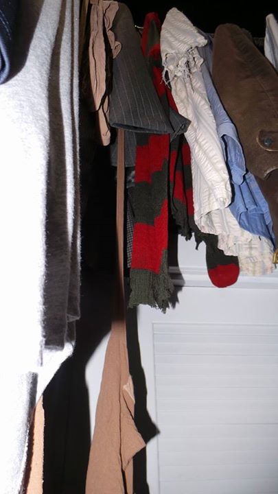 This seems like a random weird image, but it's from a section of the house that makes you feel like you're in the closet being attacked by Myers, and there are two shirts hanging in the closet paying homage to two former Halloween Horror Nights houses: Freddy Krueger's sweater, and to the right of that, Leatherface's white shirt.